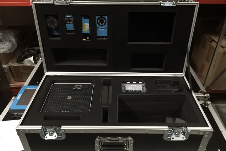 Foam insert for sensitive electronics holding SICK sensors in a flight case